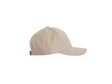 Amundsen Wool Cap i oatmeal, sett fra siden med norgesreima-detalj