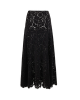 byTiMo Lace Velvet Skirt i sort med blomstermønstrede blonder og bølget kant, sett bakfra. 